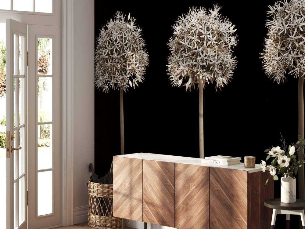 Drei Alliumblüten in einer Reihe