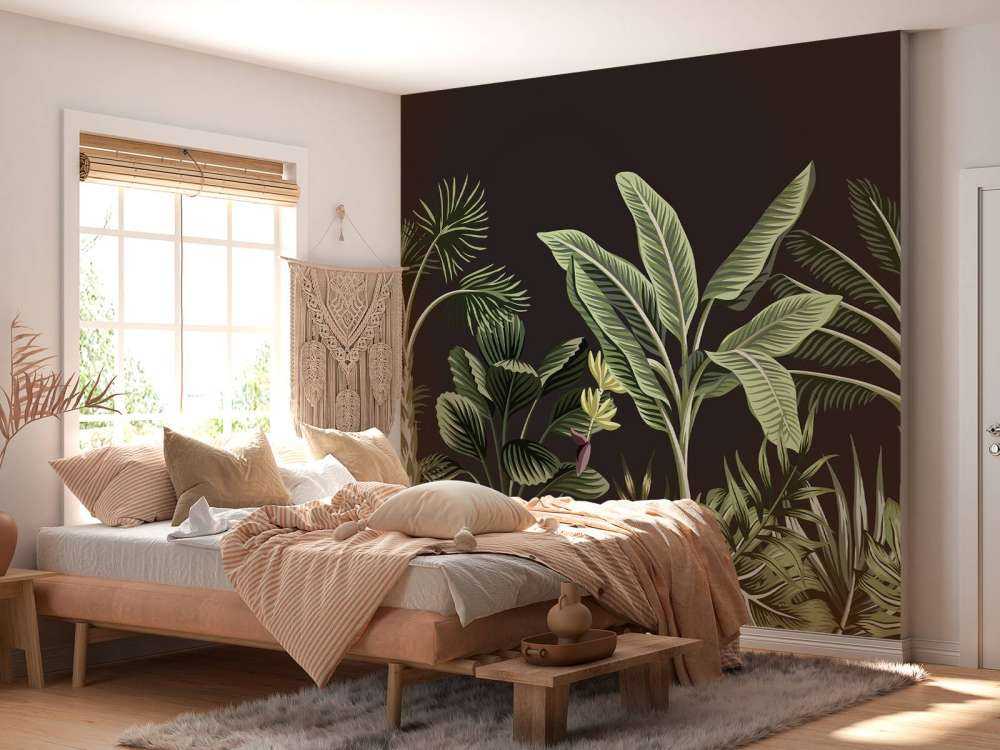 Tropische Palme auf dunklem Hintergrund