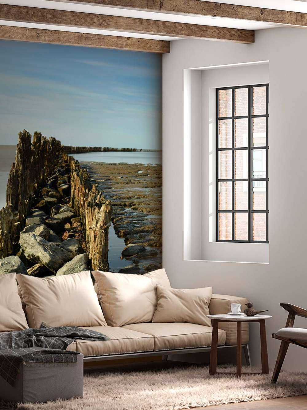 Wellenbrecher aus Holz und Stein