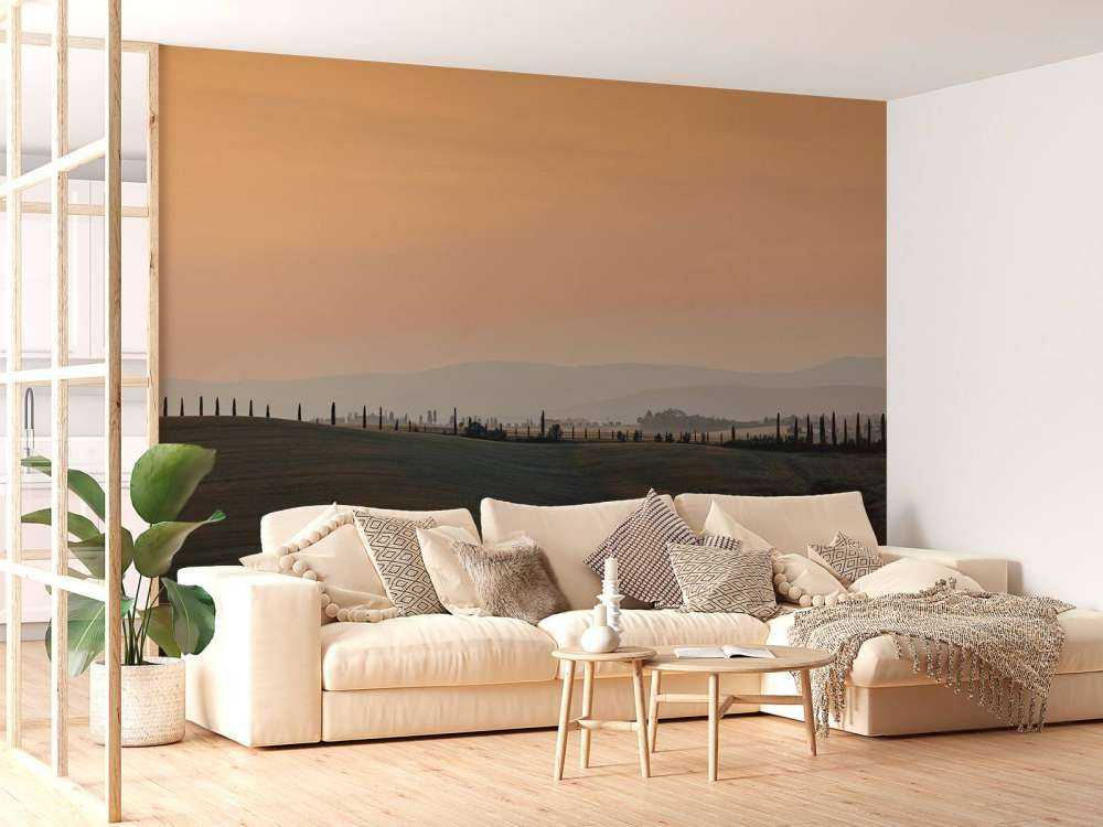 Orangefarbenes Leuchten über italienischer Landschaft