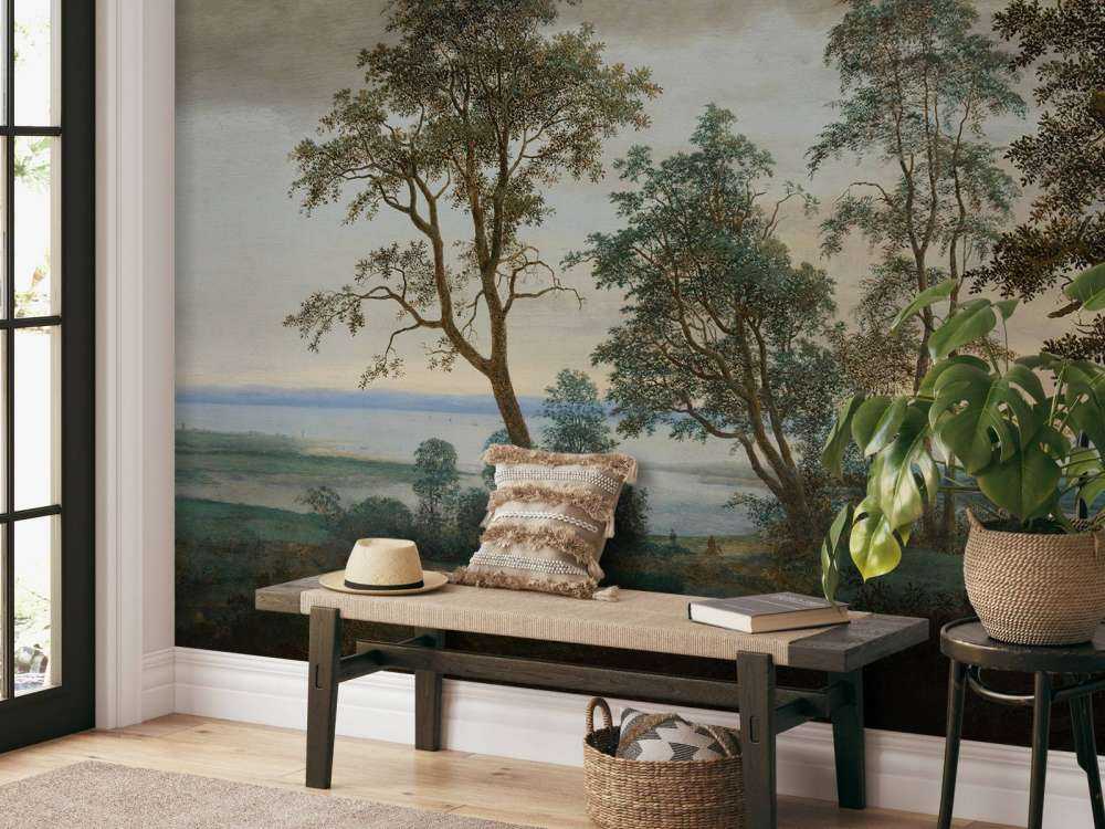 Flusslandschaft durch Bäume gesehen